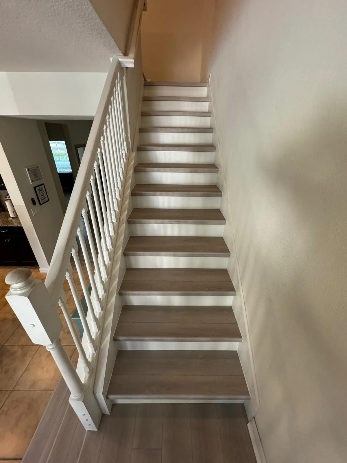 Finished hardwood stair treads, risers and trim